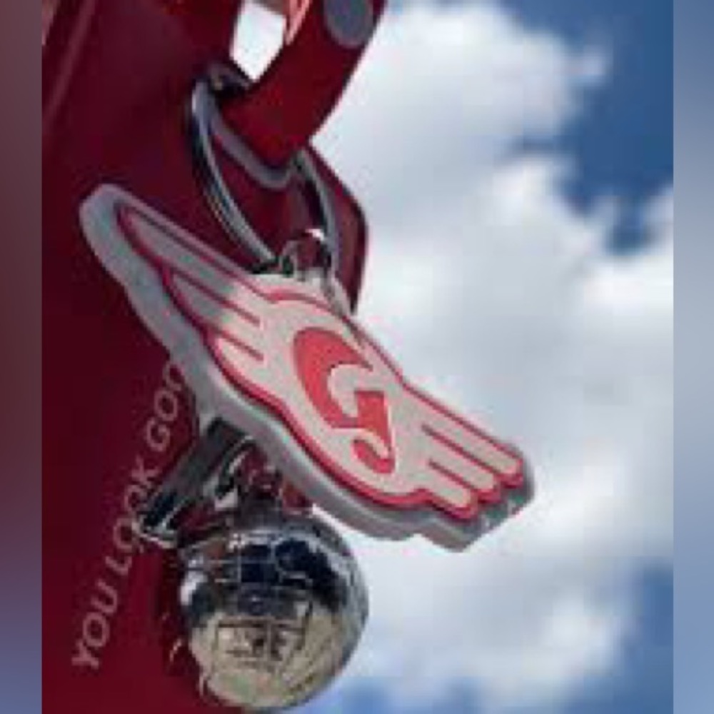 Glossier DC store exclusive luggage tag